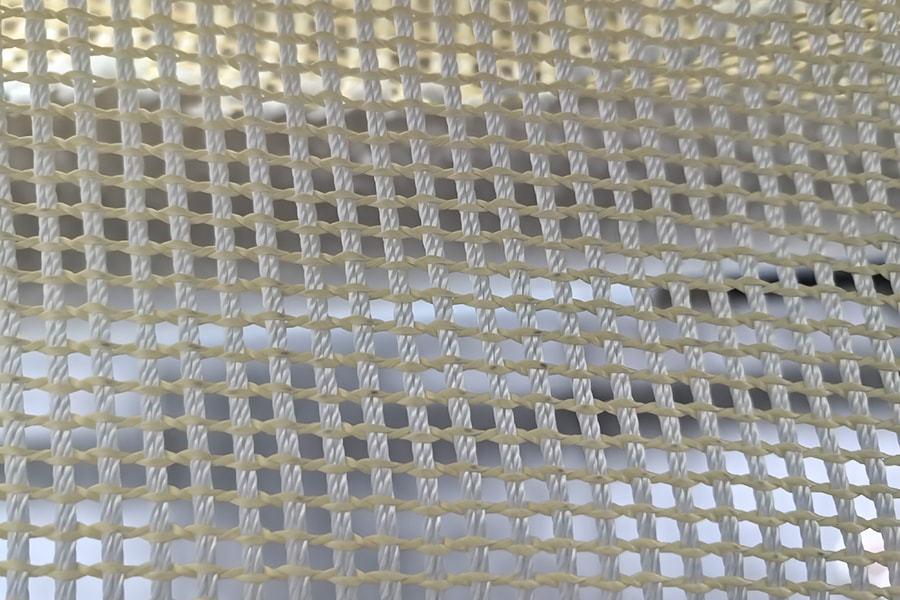 Höghållfast aramidförstärkt Mesh Fabric Roll – för kompositbasmaterial Höghållfast aramidförstärkt Mesh Fabric Roll – för kompositbasmaterial