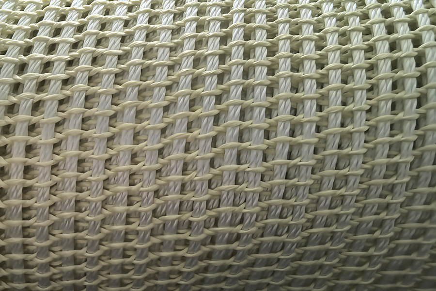 Höghållfast aramidförstärkt Mesh Fabric Roll – för kompositbasmaterial Höghållfast aramidförstärkt Mesh Fabric Roll – för kompositbasmaterial